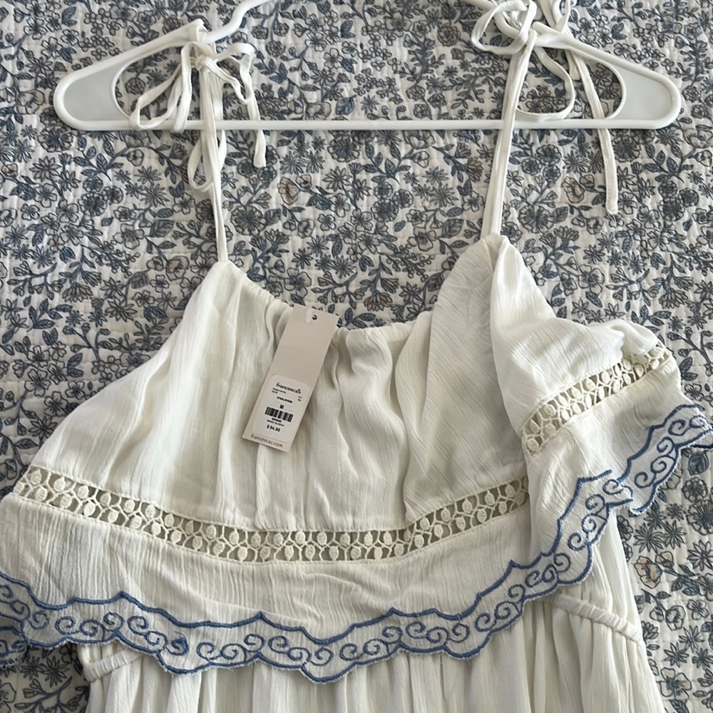 White maxi, blue embroidery, tie straps, flowy